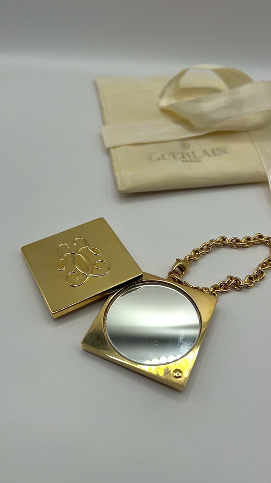 Złote lusterko Guerlain Paris na łańcuszku – vintage, z oryginalnym woreczkiem